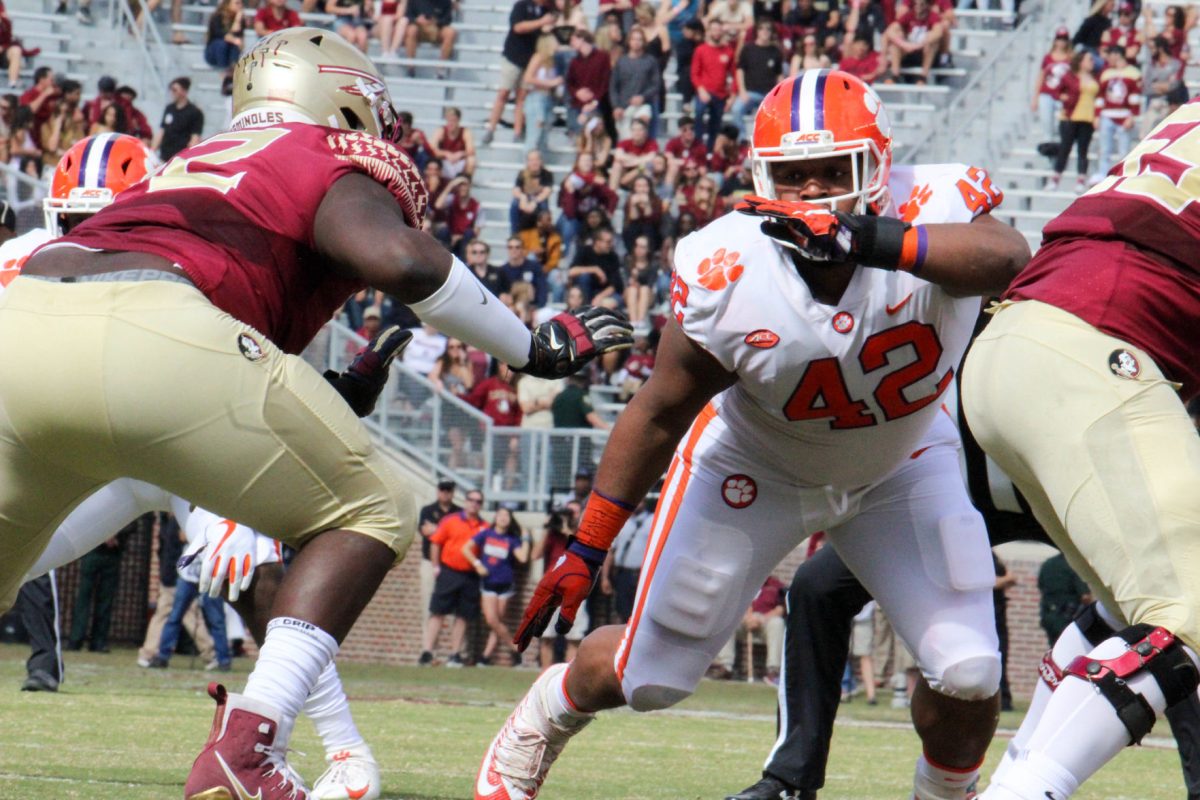Former Clemson defensive tackle Christian Wilkins (42) takes on Florida State in 2018. 