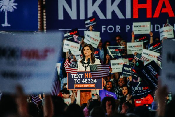 <p>Flags and signs wave in support of Nikki Haley during her campaign announcement on Wednesday, Feb. 15, 2023, at the Charleston Visitor Center.</p>