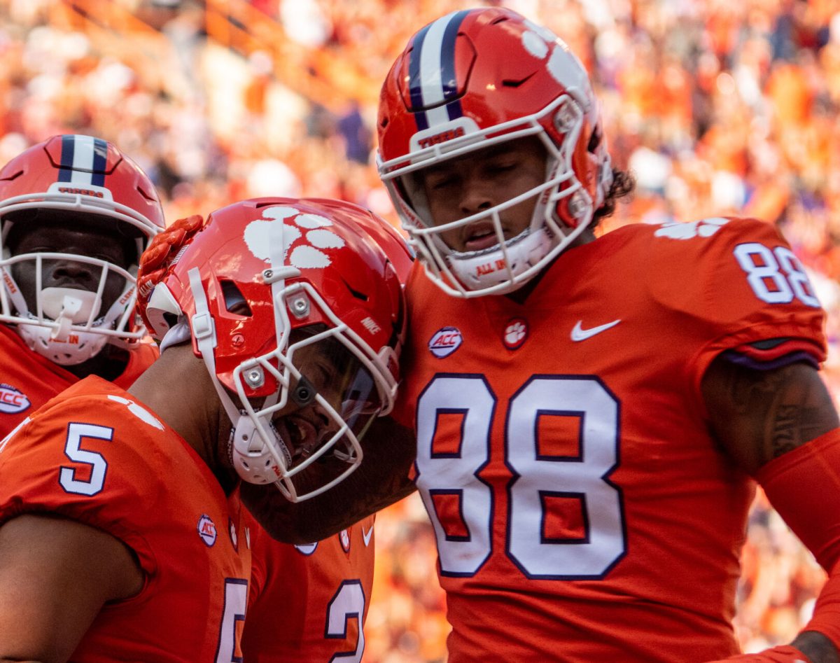 Clemson tight end Braden Galloway (88) celebrates with former quarterback DJ Uiagalelei (5) against S.C. State on Sep. 11, 2021 at Memorial Stadium.