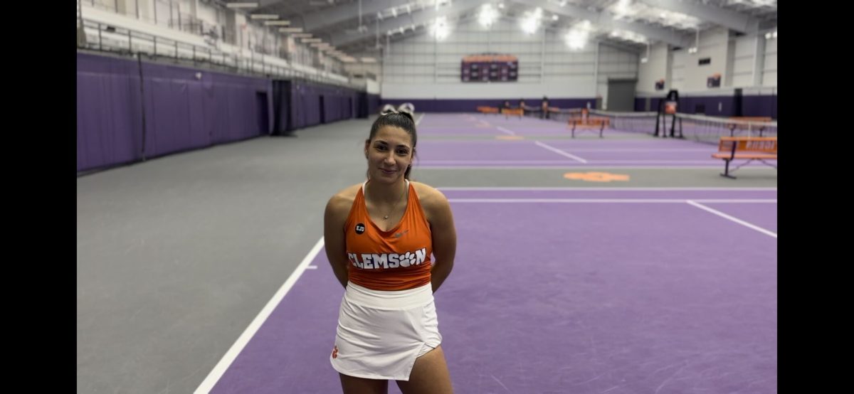 Dani Medvedeva speaks with The Tigers Patrick Driscoll after womens tennis 6-1 victory vs. Syracuse on March 17, 2023. 
