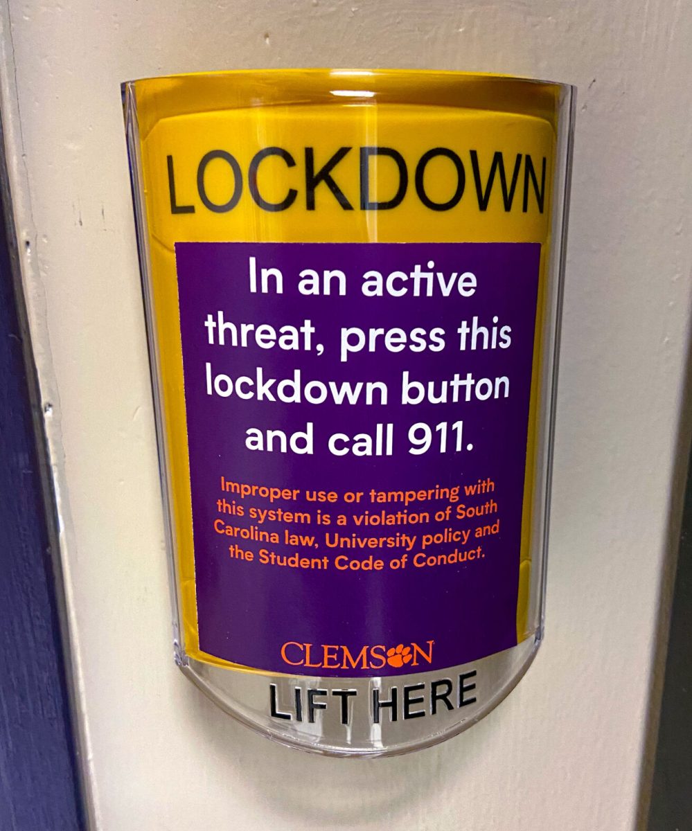 A lockdown button placed next to classroom door in the Brooks Performing Arts Center at Clemson University