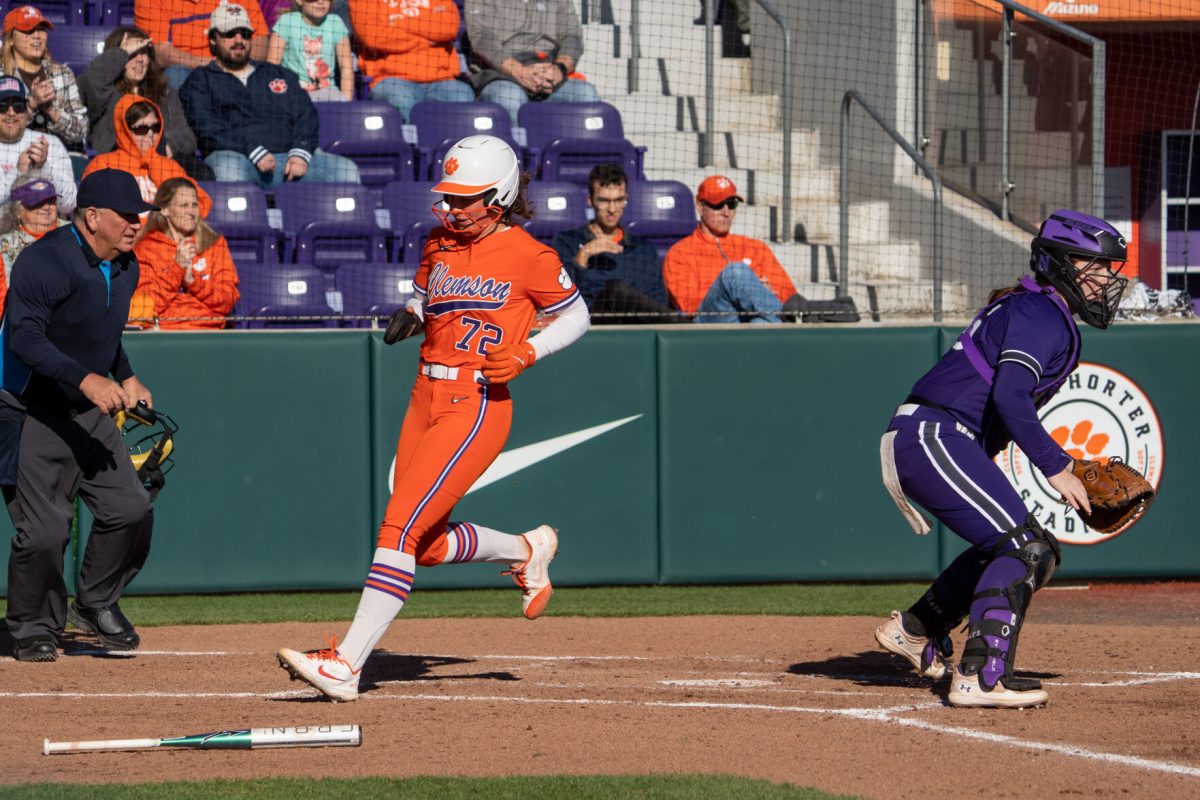 Valerie Cagle touches home plate during Clemsons 15-2 win over Northwestern at McWhorter Stadium on Feb. 17.