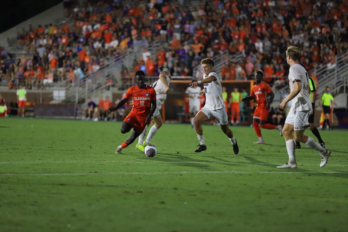 Clemson midfielder Ousmane Sylla (10) dribbles the ball against South Carolina at Historic Riggs Field on Sept. 1, 2023.
