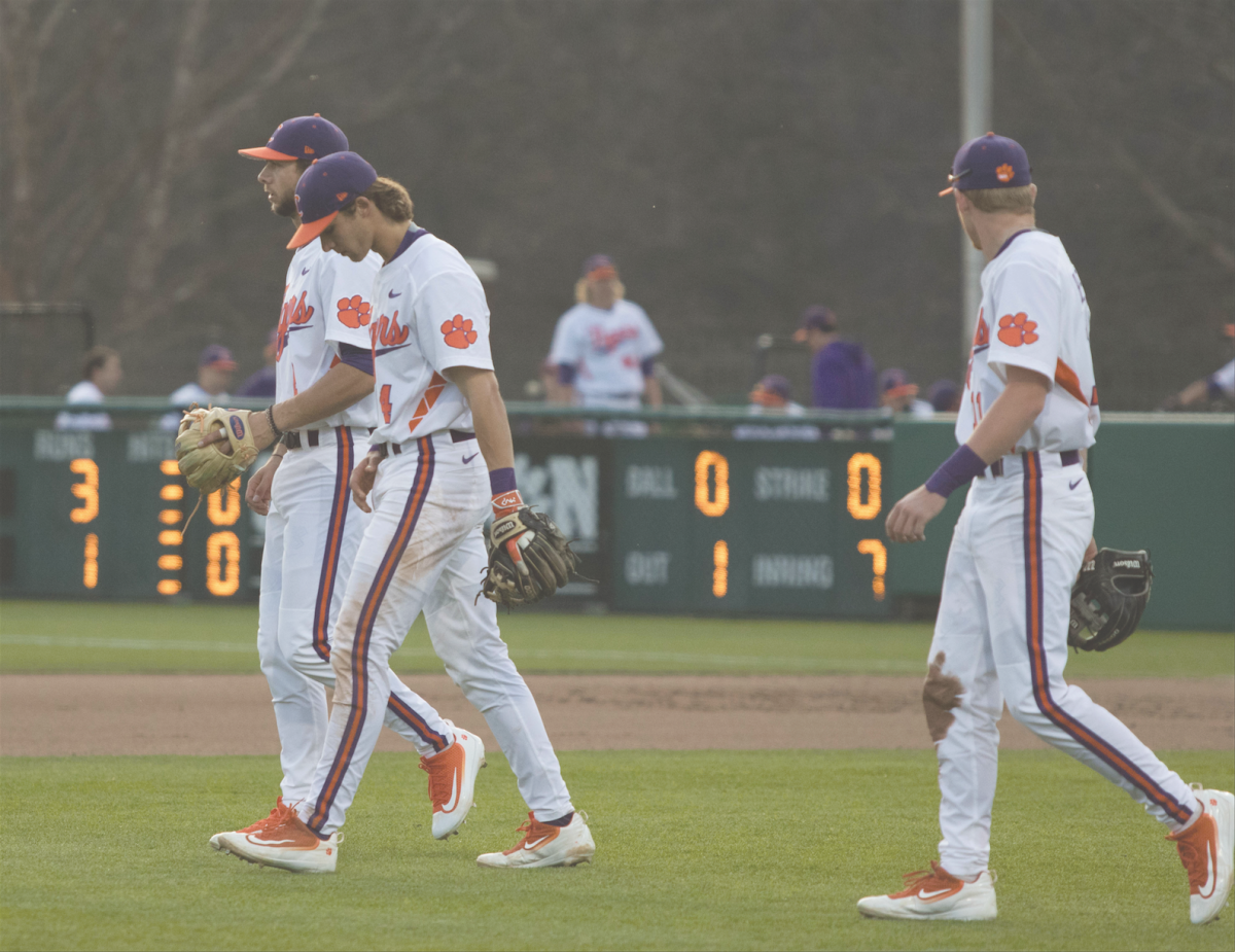 Clemson+infielders+take+the+field+during+a+game+at+Doug+Kingsmore+Stadium.