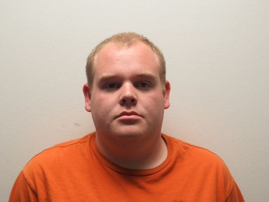 Jamie Reece Moore, 21, who is a member of Clemson Universitys Student Patrol, was arrested Wednesday for making three intimidating and harassing comments on Yik Yak related to the #SikesSitIn protest.