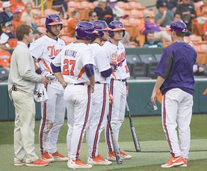 Clemson+infielders+confer+with+one+of+the+coaches+during+a+game.+The+Tigers+hope+to+host+a+NCAA+regional+at+home+this+season.