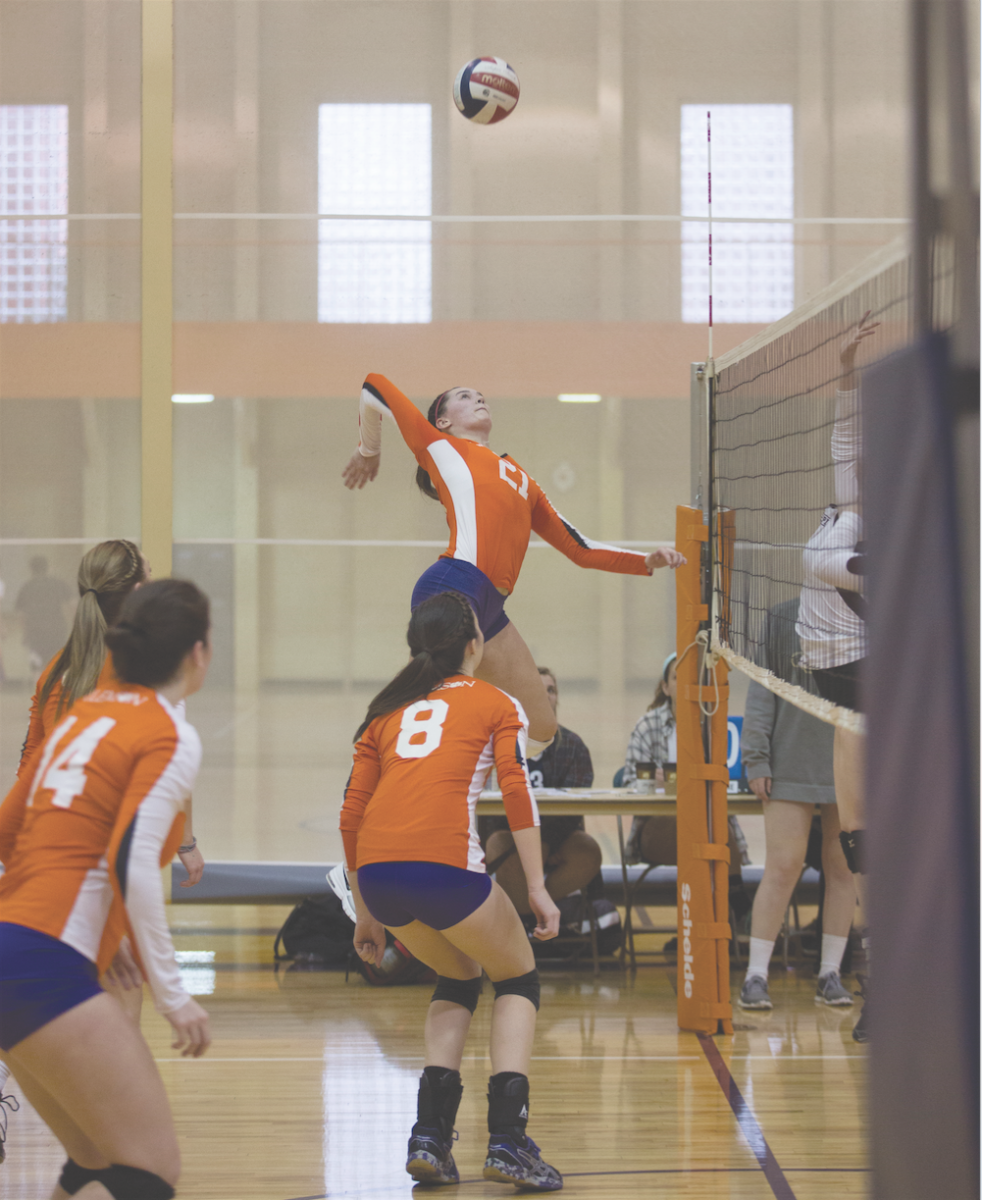 Clemson+club+volleyball+players+Savannah+N.+Miller+%2821%29+attacks+on+the+outside.