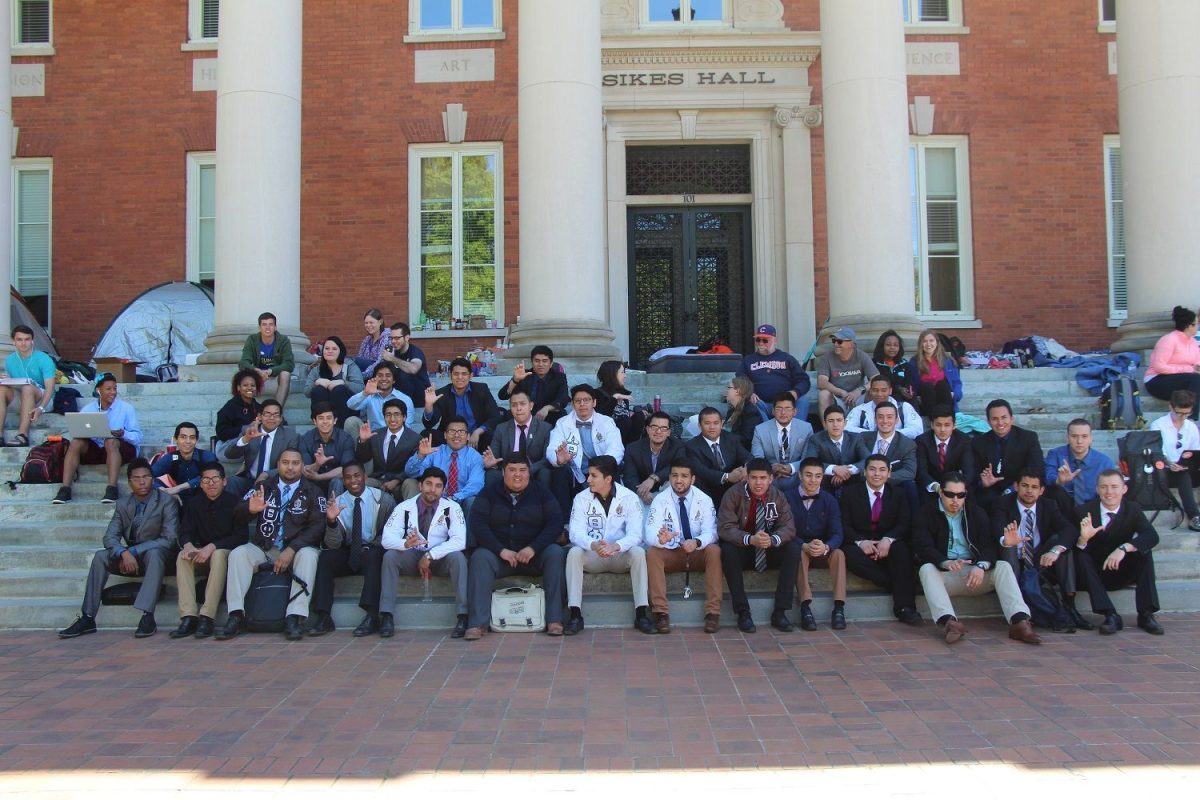 Brothers+from+Lambda+Theta+Phi+Latin+Fraternity%2C+Inc.+visited+protesters+at+%23SikesSitIn.