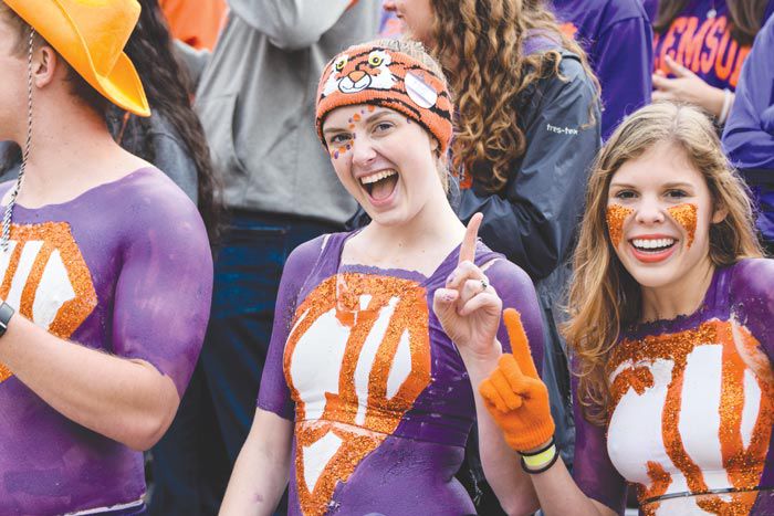 Clemson+fans+celebrate+during+a+game+at+Death+Valley.%26%23160%3B