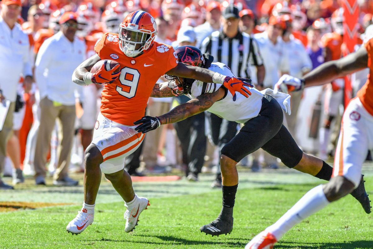 Travis Etienne (9) had just eight carries for 153 yards and 1 touchdown against Louisville last week. Etienne is averaging 8.6 yards per carry this season.&#160;