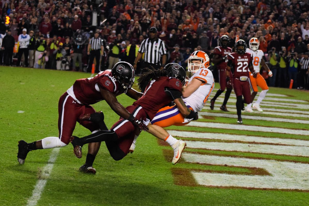 Hunter Renfrow catches a touchdown pass during last year's game against South Carolina in Columbia. Clemson will be going for its fifth win in a row against their SEC rival.&#160;