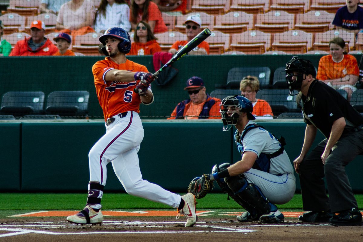 Sam Davis (5) hits a home run against the Blue Devils. Davis played well against Duke, wracking up three home runs in the three-game series.&#160;