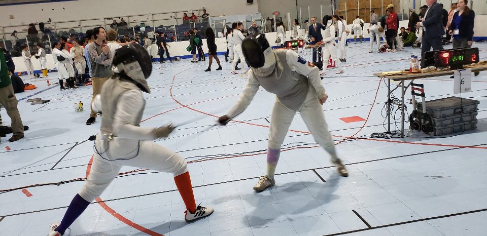 Rebecca+West+%28left%29+competes+at+the+womens+foil+event+during+the+Collegiate+Fencing+Championships.+The+women+finished+14th+out+of+27+teams+in+the+foil+event+and+West+won+two+of+her+bouts.%26%23160%3B