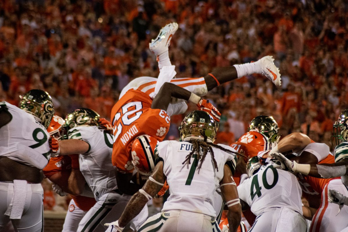 Clemson running back Lyn-J Dixon flips into the end zone in a 52-10 win over Charlotte.&#160;