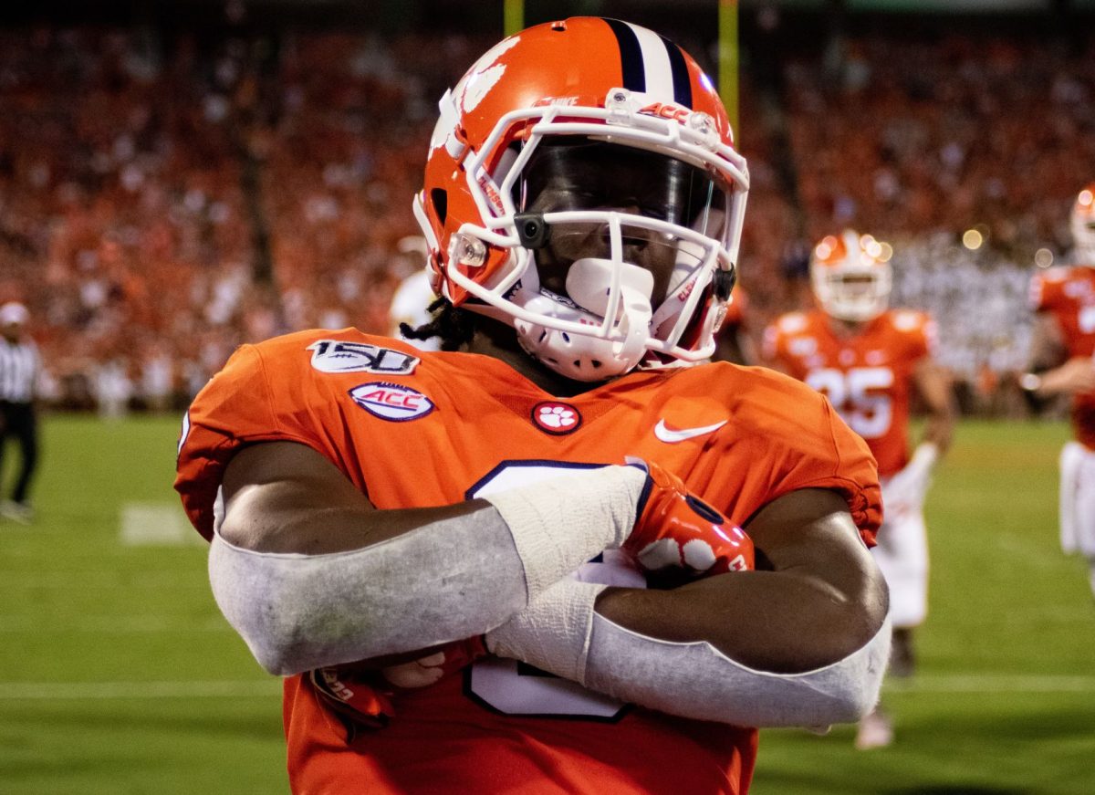 Travis Etienne celebrates a touchdown in Clemson's week one win over Georgia Tech.&#160;