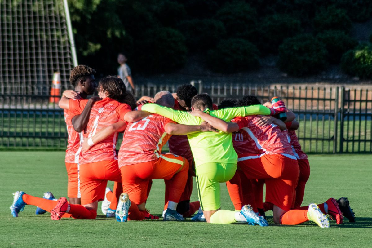 Clemson's men's soccer team gathers before a match at Historic Riggs Field.