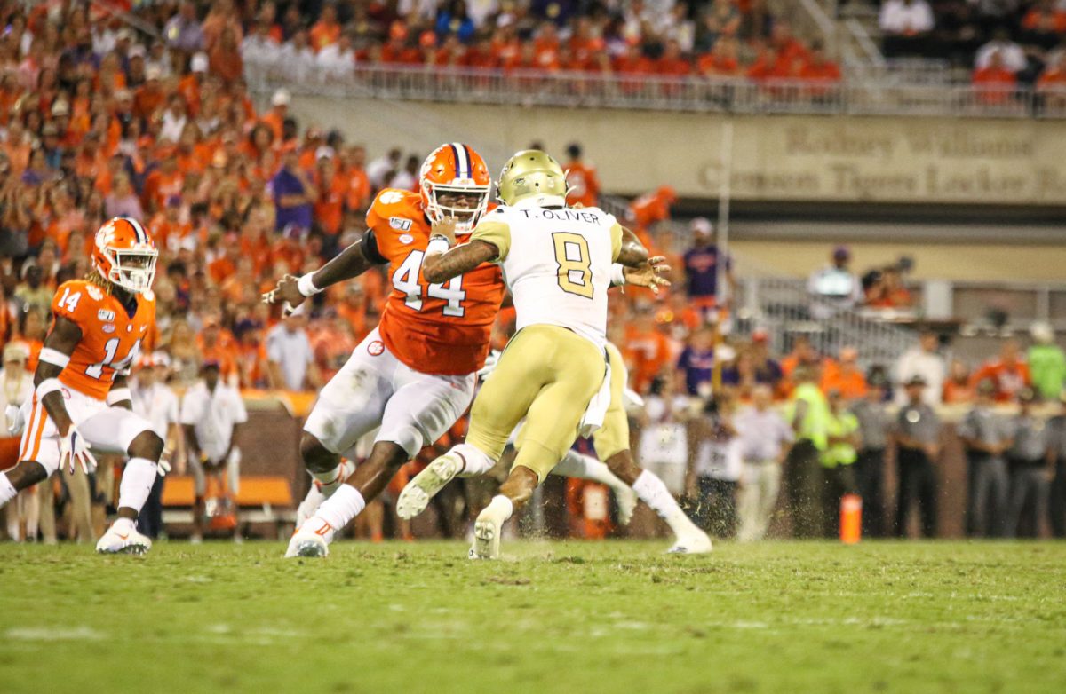 Defensive tackle Nyles Pinckney (44) makes a tackle in Clemson's opening game of 2019.