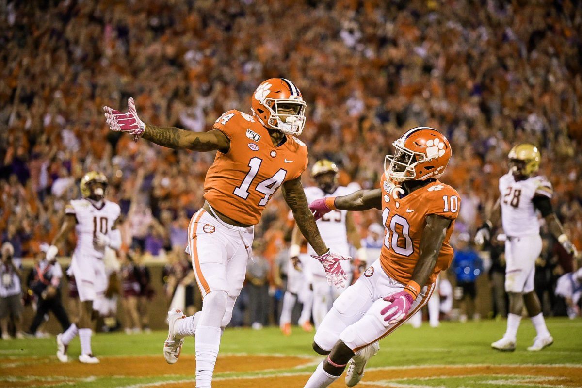 Clemson receivers Diondre Overton (14) and Joseph Ngata (10) celebrate after one of Overton's three touchdown receptions.&#160;