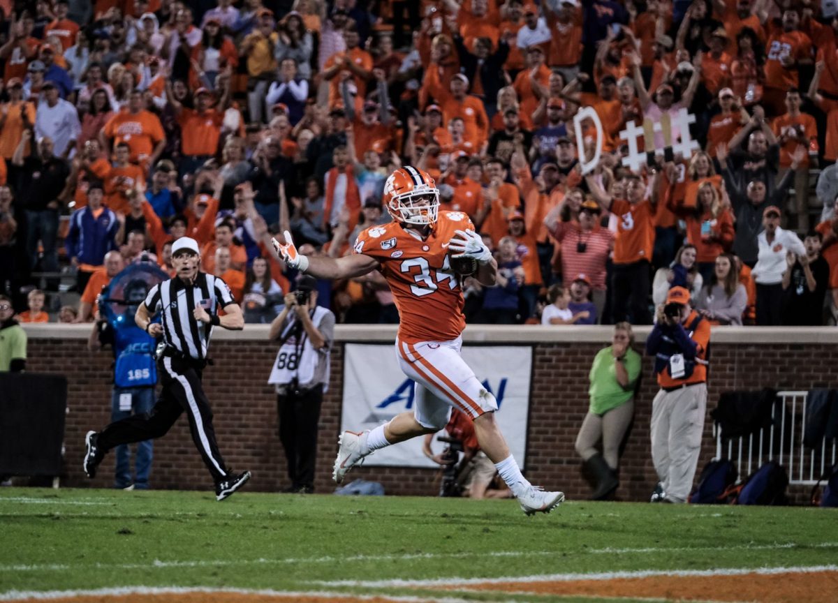 Clemson defensive end Logan Rudolph (34) returns a fumble for a touchdown against Boston College.