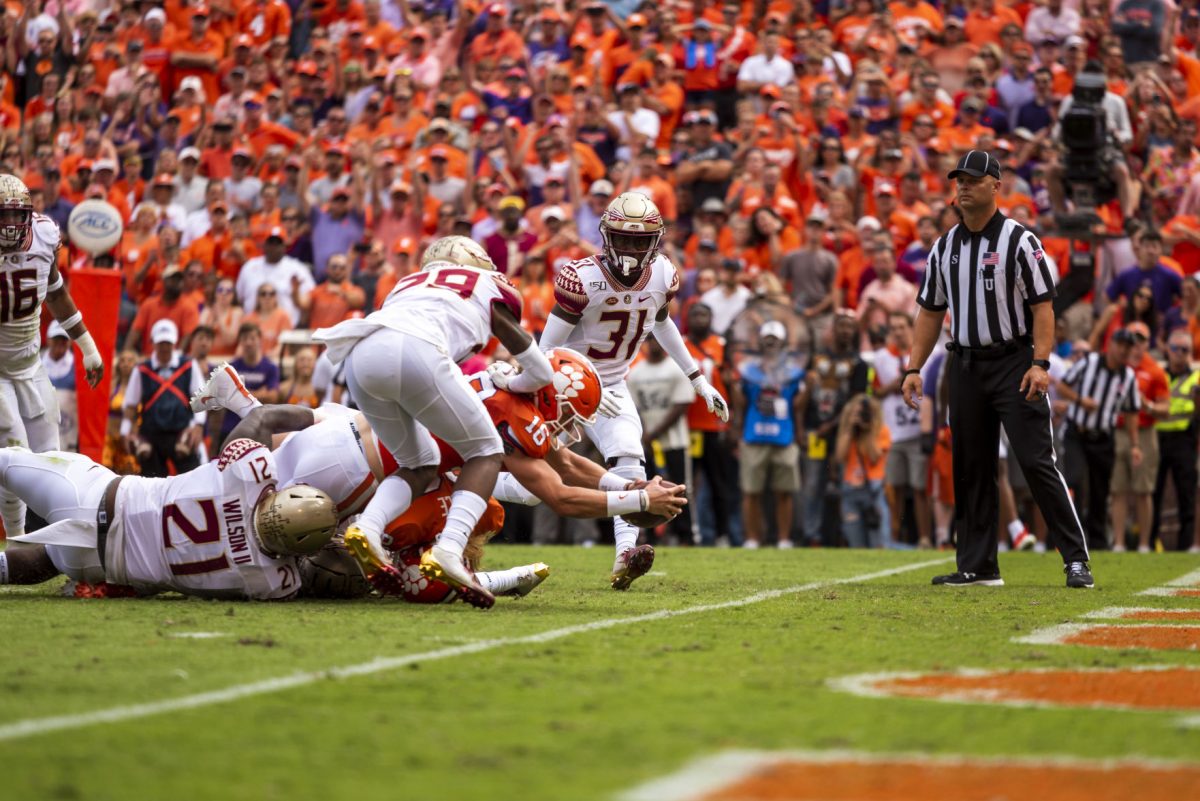 Quarterback Trevor Lawrence dives for the endzone in Clemson's 45-14 victory over Florida State.&#160;