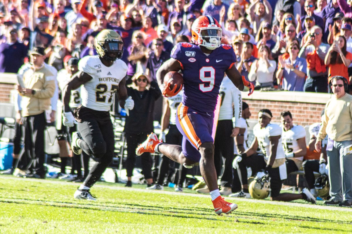 Clemson running back Travis Etinne (9) races into the endzone against Wofford.&#160;&#160;