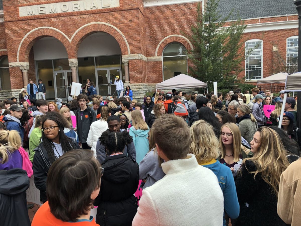 Students gather near the Clemson Bell tower prior to the march