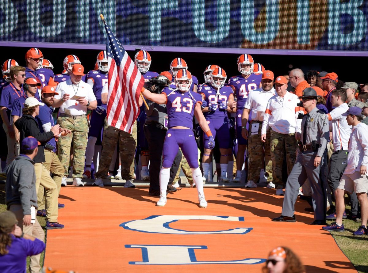 Clemson+linebacker+Chad+Smith+%2843%29+waves+the+flag+ahead+of+the+Military+Appreciation+Game.%26%23160%3B