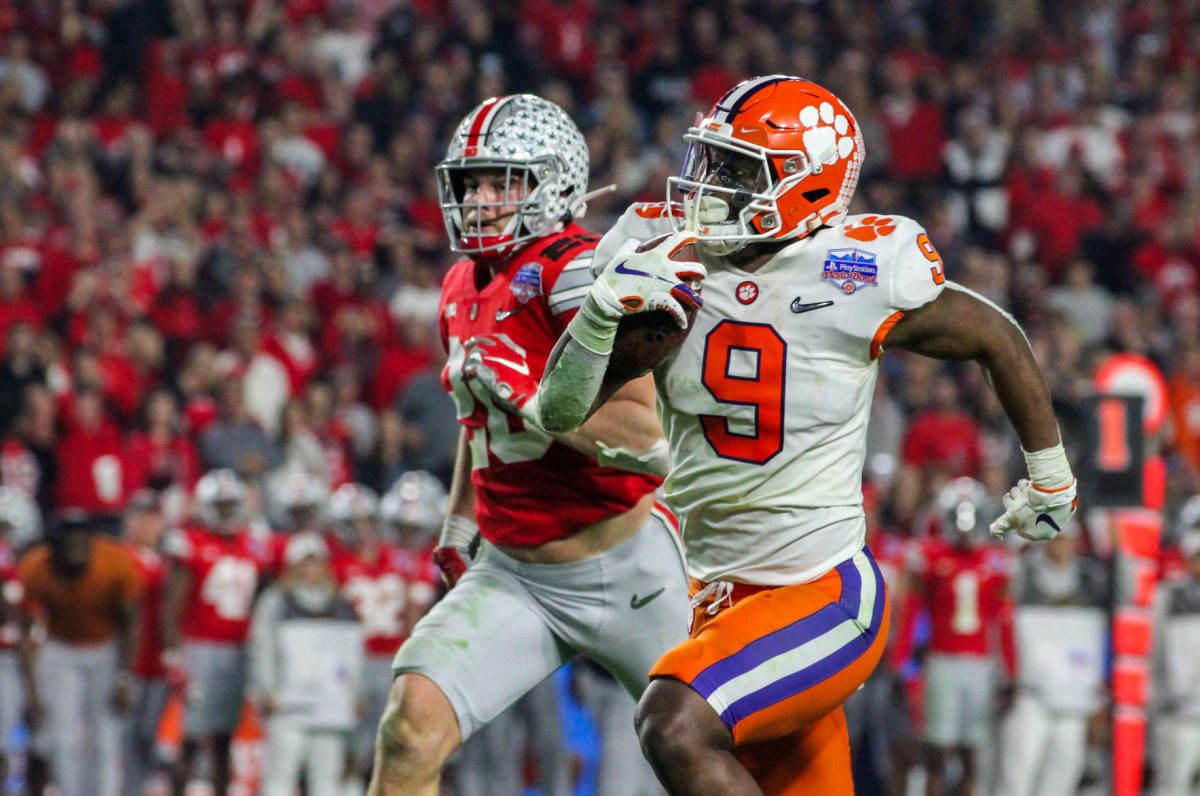 Clemson running back Travis Etienne (9) rushes downfield against Ohio State.&#160;