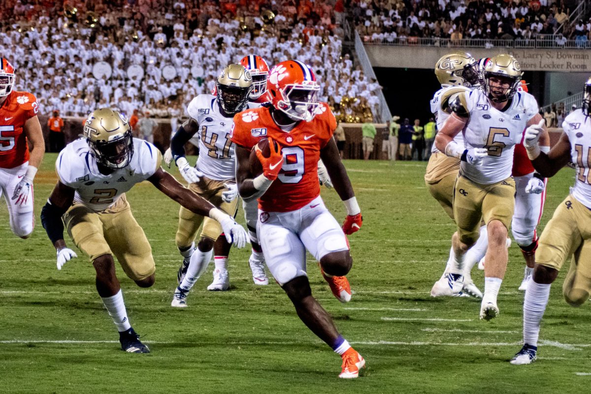 Junior running back Travis Etienne (9) carries the ball to the end zone during the Tigers' first game of the 2019 season. The Tigers again open the season against Georgia Tech, this year in Atlanta.