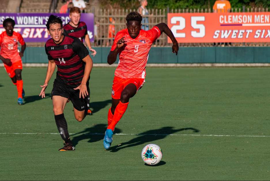 Senior Forward Kimarni Smith (9) takes the ball up the field in last years matchup against the South Carolina Gamecocks