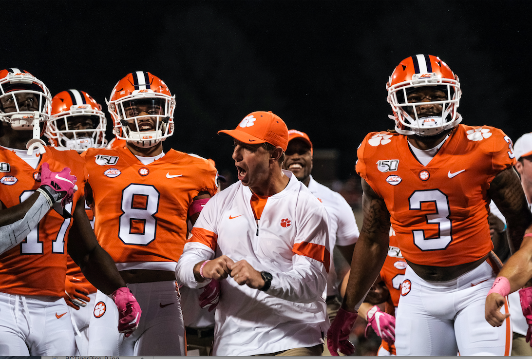 Dabo Swinney leads the team in the Walk of Champions before the Boston College game in 2019