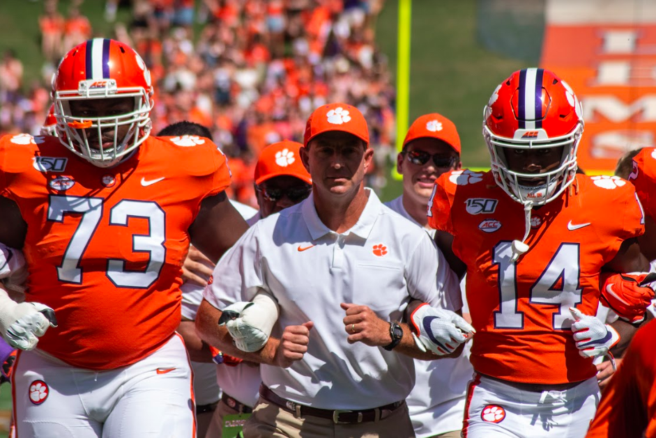 Head Coach Dabo Swinney leads the team in the Walk of Champions in the 2019 game against Texas A&amp;M