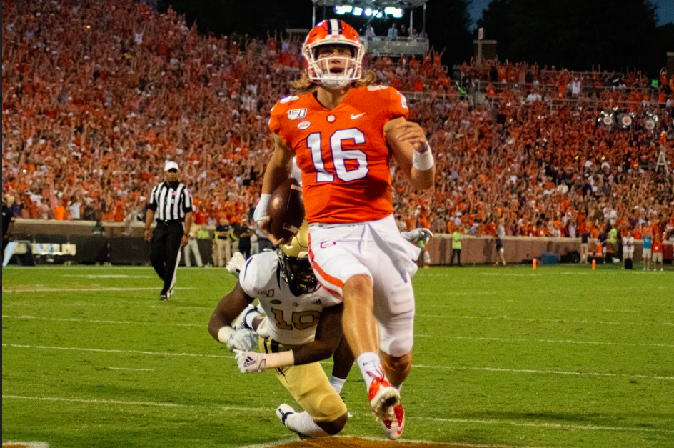 Trevor Lawrence (16) runs the ball in for a touchdown in the 2019 game against Georgia Tech.&#160;