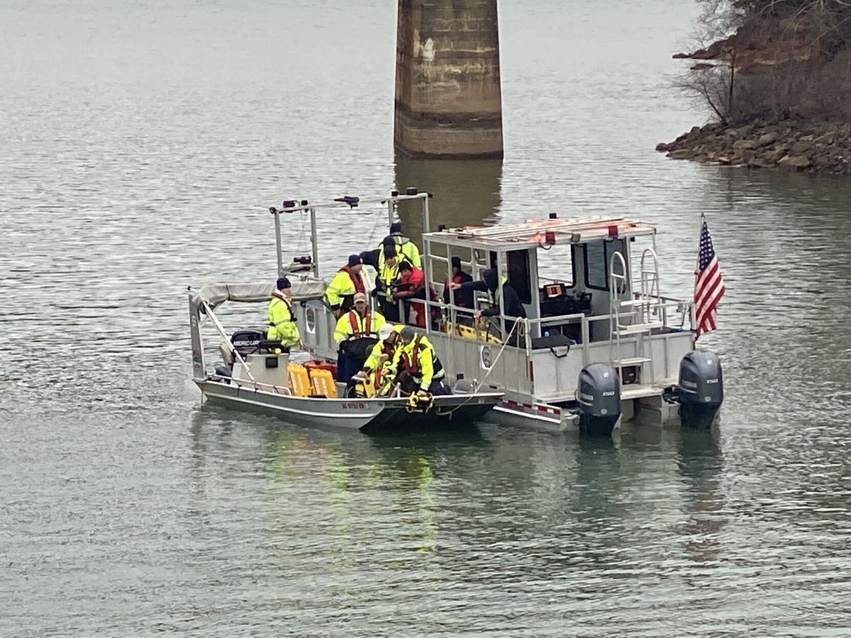 Emergency crews deploy an underwater drone after detecting something on the lake floor.
