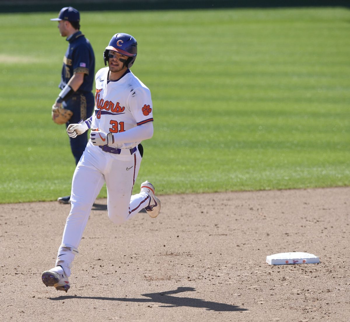 Clemson first baseman Caden Grice (31) rounds the bases after hitting a solo home run against Notre Dame Sunday, March 7, 2021 at Clemson's Doug Kingsmore Stadium. (Bart Boatwright, The Clemson Insider)