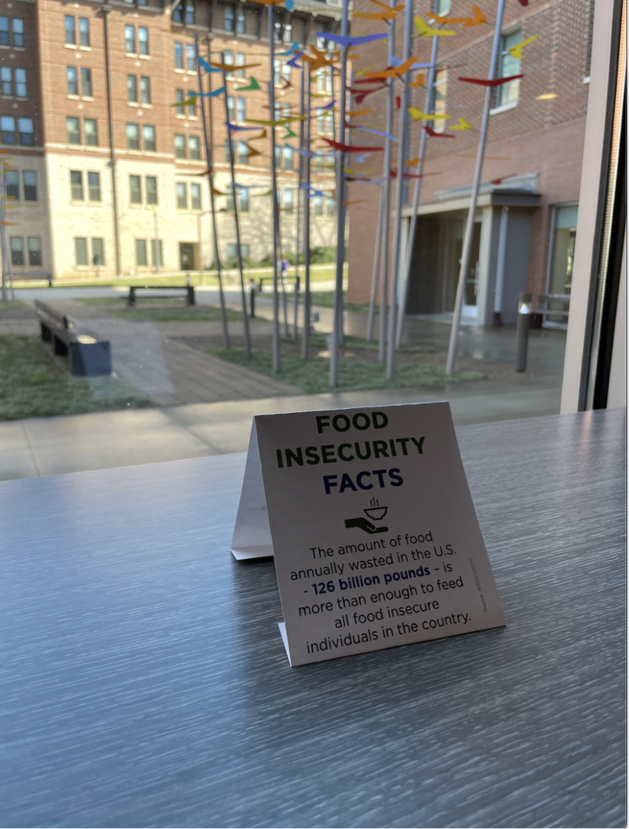 On various dining tables, small cards were placed that displayed facts about food insecurity.&#160;