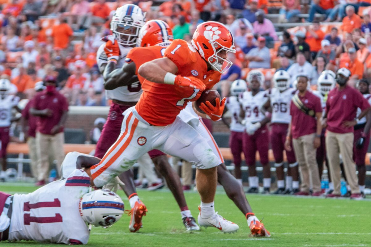 Clemson+running+back+Will+Shipley+%281%29+attempts+to+break+a+tackle+against+South+Carolina+State+in+Memorial+Stadium+on+Sept.+11%2C+2021.