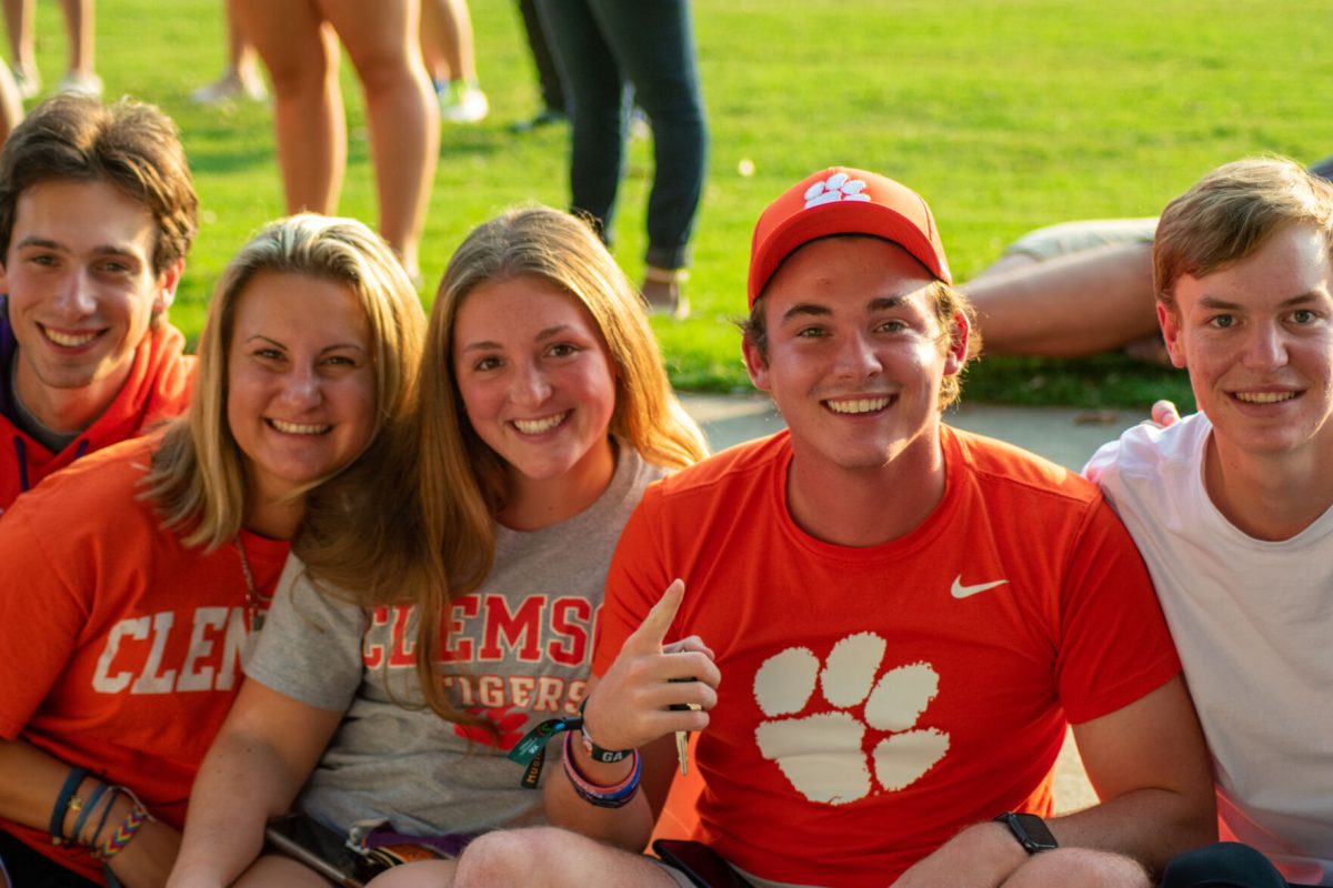 Clemson students, alumni and families lined the sidewalk along Bowman Field and Highway 93 to watch the First Friday Parade.