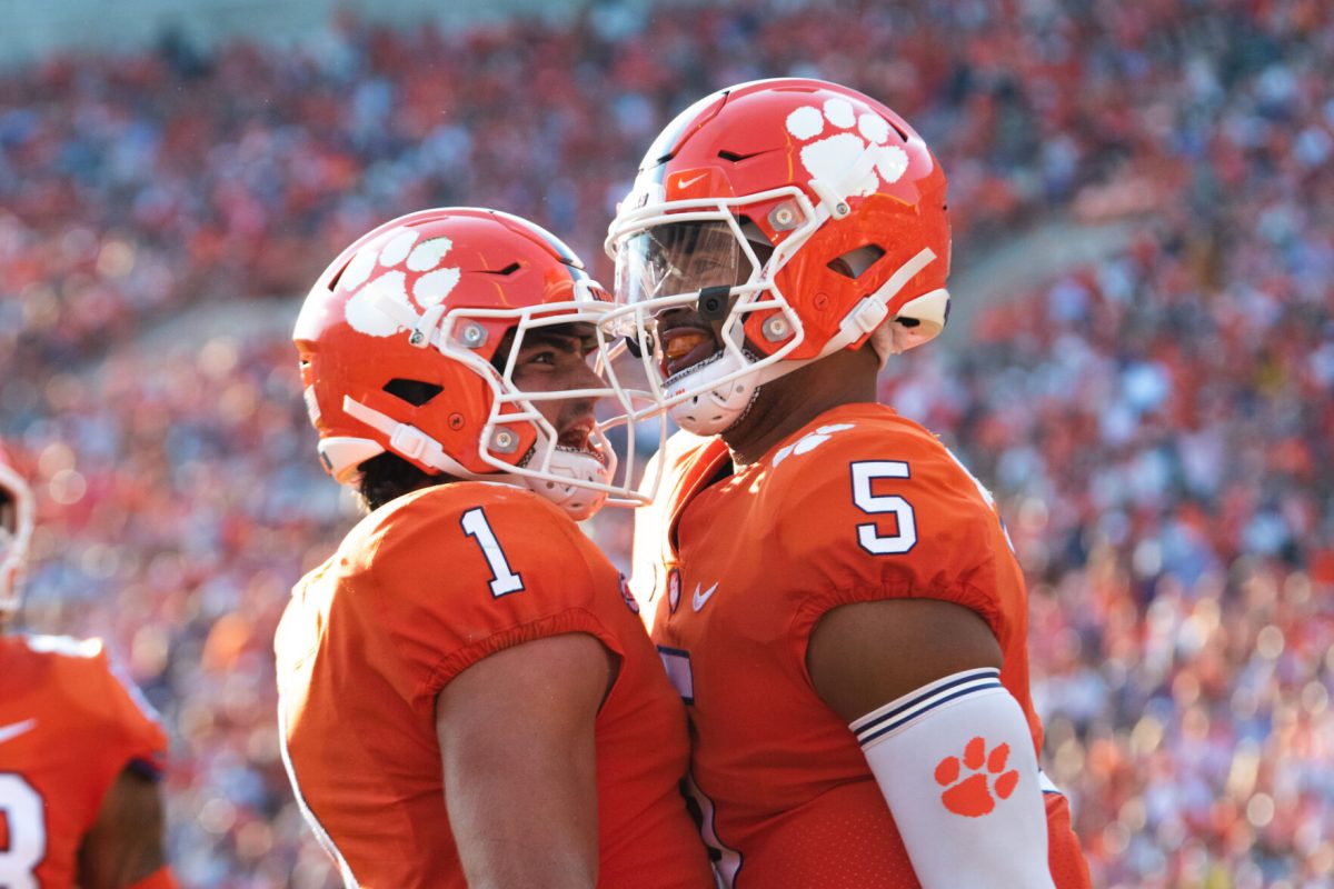 DJ Uiagalelei (5) and Will Shipley (1) celebrate together against South Carolina State on Sept. 11, 2021.
 
