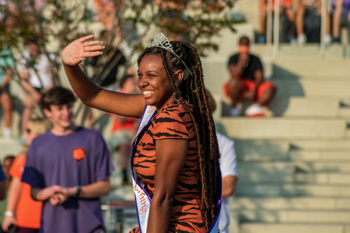 Olivia Loynes, Clemson alumna and 2019 Miss Homecoming, finally gets her chance to ride in the First Friday Parade after winning the&#160;pageant two years ago.