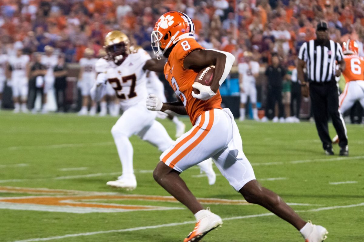 Clemson wide receiver Justin Ross (8) runs with the ball following a reception in the first quarter of the Tigers' game against Boston College on Oct. 2, 2021 at Memorial Stadium. After the departure of running back Lyn-J Dixon, Ross is the only active Tiger with a touchdown reception (3).