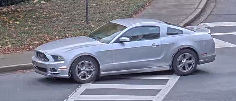 The individual appeared to be driving a silver 2013 or 2014 Ford Mustang.