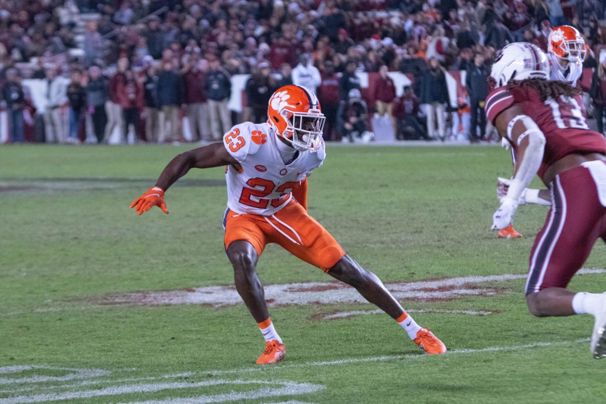 Clemson+cornerback+Andrew+Booth+Jr.+%2823%29+lines+up+against+South+Carolina+wide+receiver+E.J.+Jenkins+%2813%29+in+the+2021+Palmetto+Bowl+on+Nov.+27%2C+2021.
