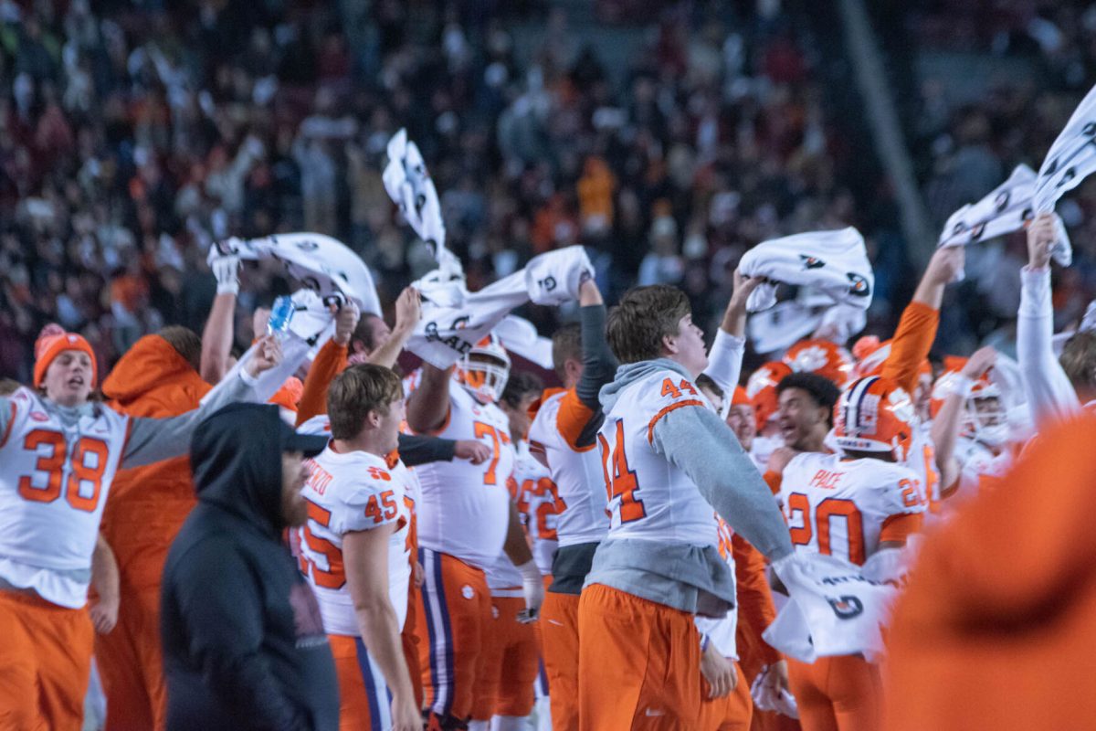 Clemson football players wave Gatorade towels to Darude's "Sandstorm" prior to the fourth quarter of their Nov. 27, 2021 matchup with the South Carolina Gamecocks at Williams-Brice Stadium in Columbia, S.C.