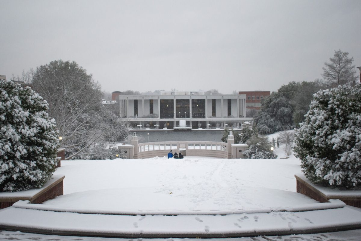 Central campus, with Cooper Library in the distance, sits with a white blanket covering it early on the morning of Jan. 16, 2022.