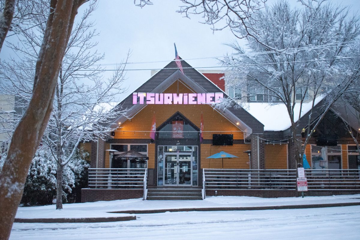 ITSURWIENER and the surrounding trees sit covered in snow early in the morning on Jan. 16, 2022.