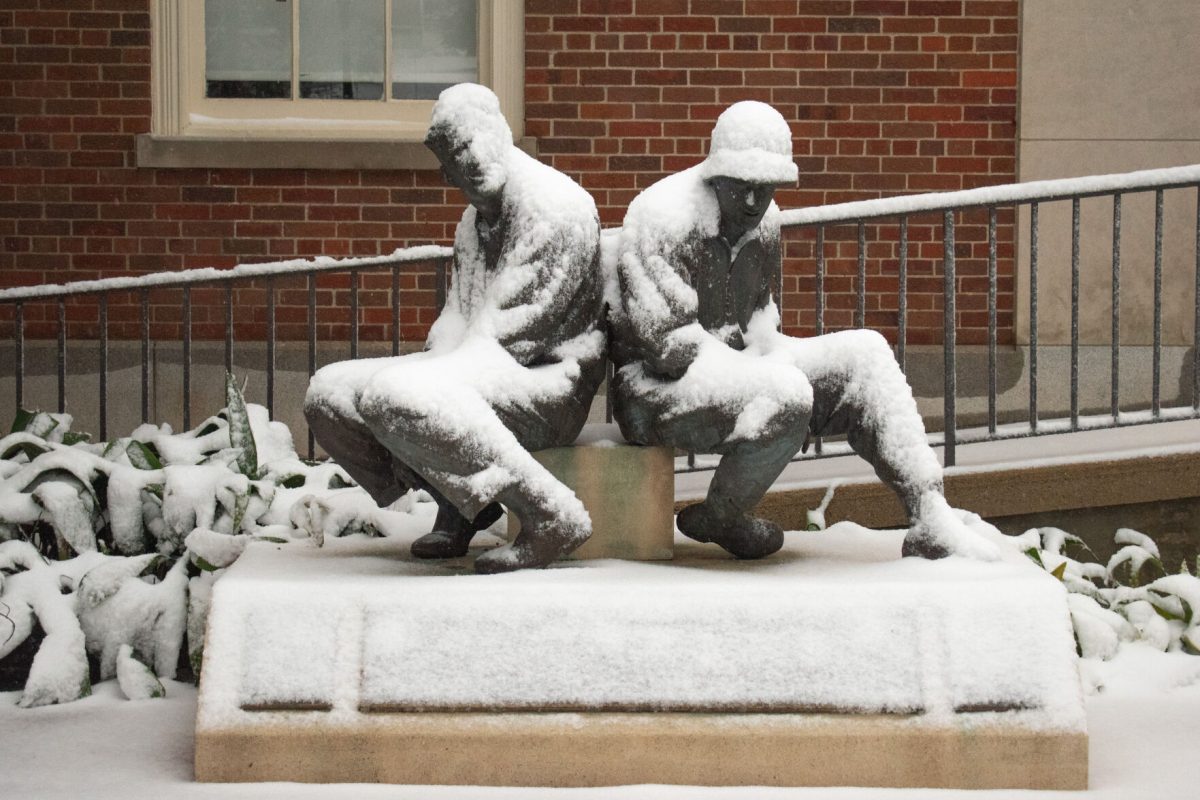 The And Then There Was War statue sits covered in snow early in the morning of Jan. 16, 2022.