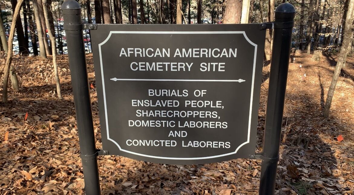 This sign in the Woodland Cemetery is an outline of the area where most of the Black laborers were buried.