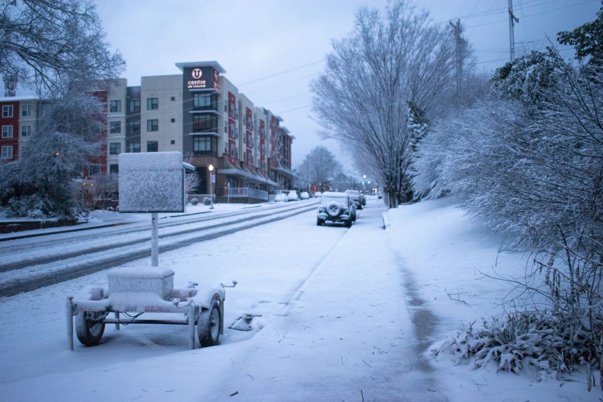College Avenue in downtown Clemson sits covered in a white blanket of snow early on the morning of Jan. 16, 2022.