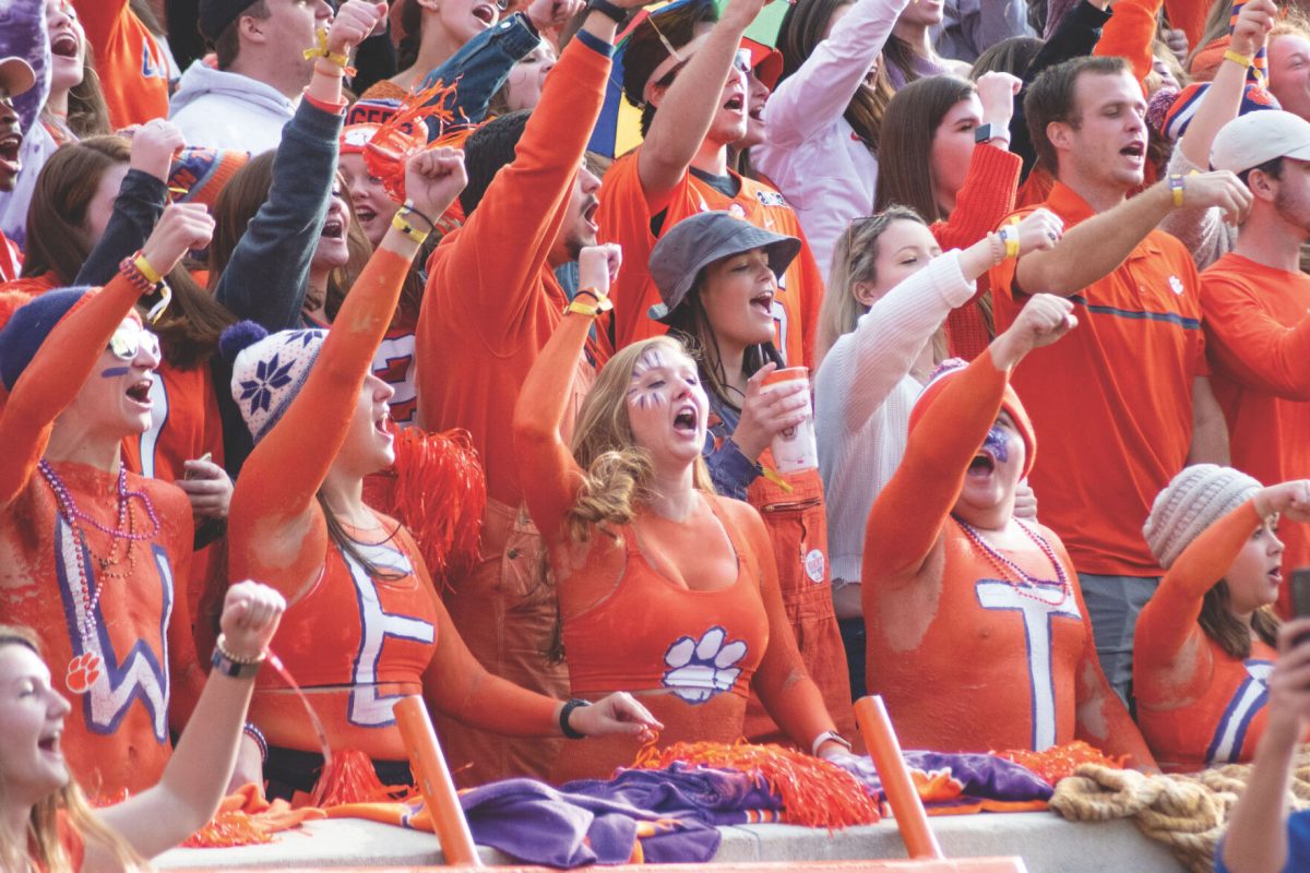 Clemson+students+spellout+the+universitys+name+at+the+end+of+Tiger+Rag.+Central+Spirit%2C+first+row+in+body+paint%2C+does+not+allow+its+members+to+partake+in+adding+profanity+to+the+fight+song.